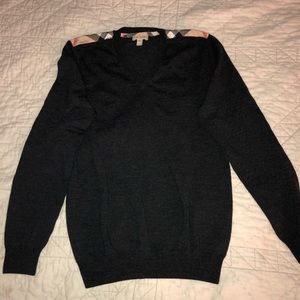 Burberry V- neck sweater.